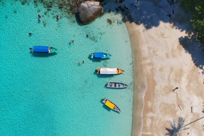 Limestone cliffs and crystalline turquoise waters along the secluded French Riviera coastline