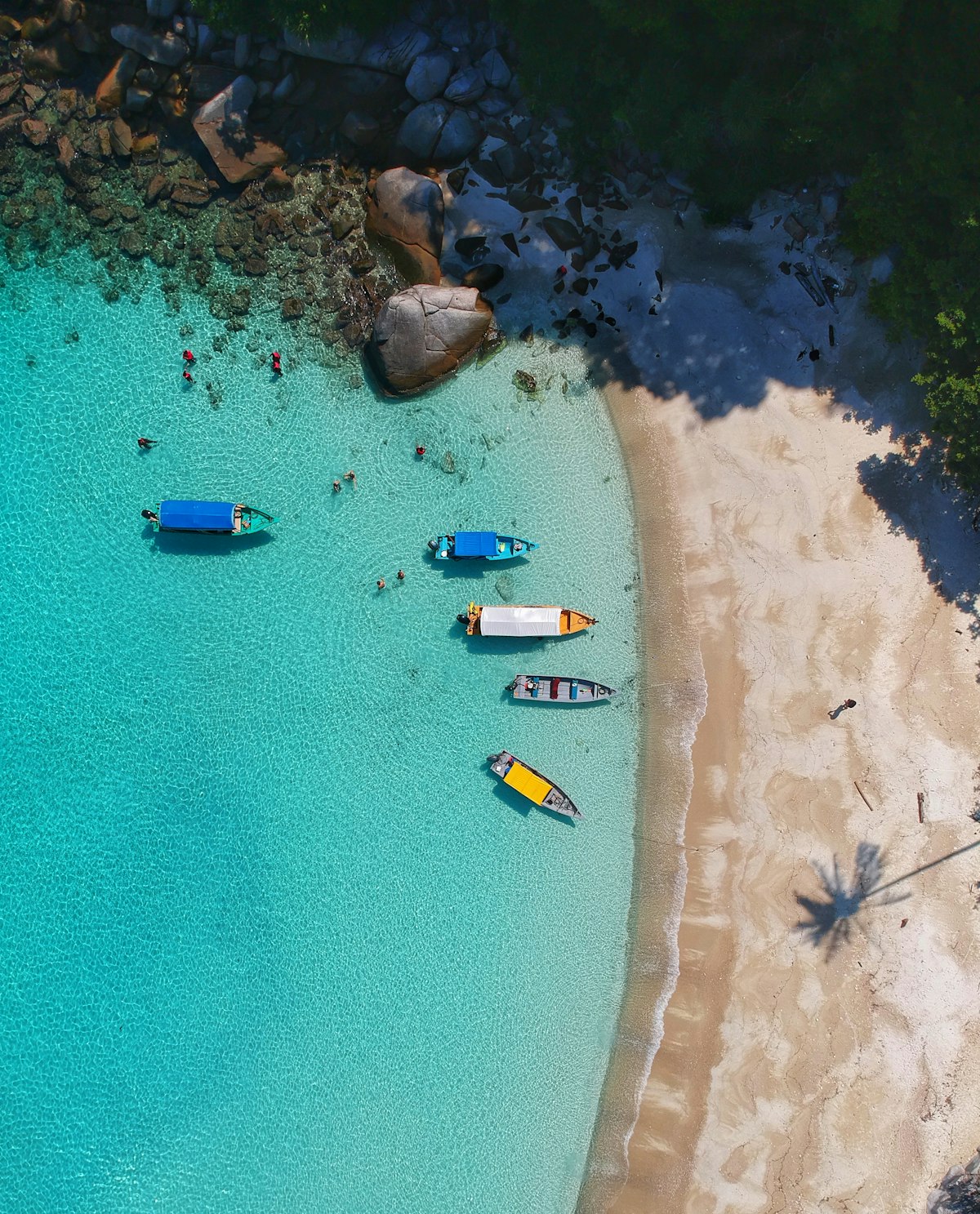 Limestone cliffs and crystalline turquoise waters along the secluded French Riviera coastline